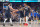 DALLAS, TX - JUNE 12: Luka Doncic #77 high fives Kyrie Irving #11 and PJ Washington #25 of the Dallas Mavericks during the game against the Boston Celtics during Game 3 of the 2024 NBA Finals on June 12, 2024 at the American Airlines Center in Dallas, Texas. NOTE TO USER: User expressly acknowledges and agrees that, by downloading and or using this photograph, User is consenting to the terms and conditions of the Getty Images License Agreement. Mandatory Copyright Notice: Copyright 2024 NBAE (Photo by Jesse D. Garrabrant/NBAE via Getty Images)