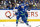 VANCOUVER, CANADA - MAY 20: Ilya Mikheyev #65 of the Vancouver Canucks hits the puck down the ice during the first period in Game Seven of the Second Round of the 2024 Stanley Cup Playoffs against the Edmonton Oilers at Rogers Arena on May 20, 2024 in Vancouver, British Columbia, Canada. (Photo by Jeff Vinnick/NHLI via Getty Images)