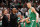 BOSTON, MASSACHUSETTS - JUNE 17: Assistant coach Sam Cassell high fives Kristaps Porzingis #8 of the Boston Celtics after a play against the Dallas Mavericks during the second quarter of Game Five of the 2024 NBA Finals at TD Garden on June 17, 2024 in Boston, Massachusetts. NOTE TO USER: User expressly acknowledges and agrees that, by downloading and or using this photograph, User is consenting to the terms and conditions of the Getty Images License Agreement. (Photo by Elsa/Getty Images)