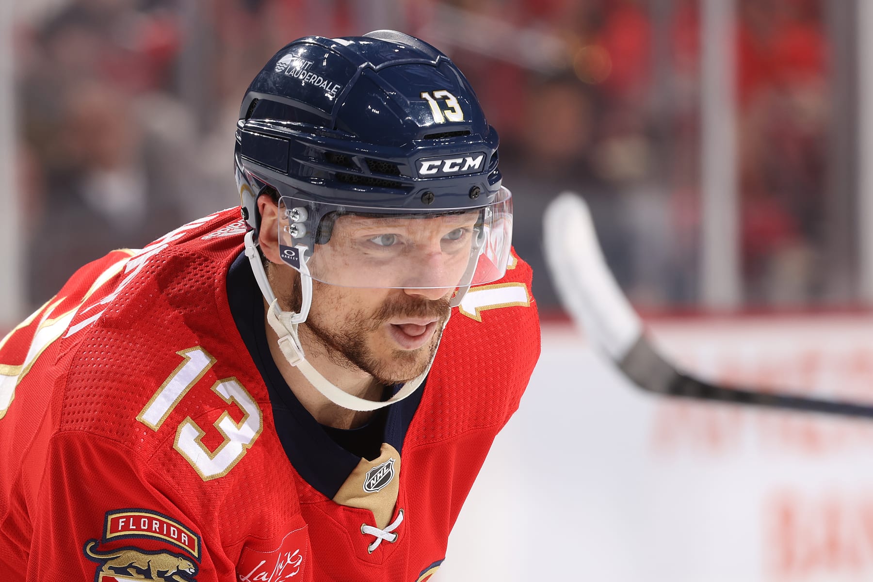 SUNRISE, FL - MAY 14: Sam Reinhart #13 of the Florida Panthers prepares for a face-off against the Boston Bruins in Game Five of the Second Round of the 2024 Stanley Cup Playoffs at the Amerant Bank Arena on May 14, 2024 in Sunrise, Florida. (Photo by Joel Auerbach/Getty Images)