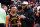 HOUSTON, TEXAS - MARCH 28: Bronny James #6 of the West team talks to Lebron James of the Los Angeles Lakers after the 2023 McDonald's High School Boys All-American Game at Toyota Center on March 28, 2023 in Houston, Texas. (Photo by Alex Bierens de Haan/Getty Images)