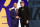 NEW YORK, NEW YORK - JUNE 26: Dalton Knecht (R) shakes hands with NBA commissioner Adam Silver (L) after being drafted 17th overall by the Los Angeles Lakers during the first round of the 2024 NBA Draft at Barclays Center on June 26, 2024 in the Brooklyn borough of New York City. NOTE TO USER: User expressly acknowledges and agrees that, by downloading and or using this photograph, User is consenting to the terms and conditions of the Getty Images License Agreement. (Photo by Sarah Stier/Getty Images)