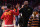 LOS ANGELES, CA - JANUARY 06: USC Trojans guard Bronny James (6) gives his dad LeBron James a high five before the college basketball game between the Stanford Cardinal and the USC Trojans on January 6, 2024 at Galen Center in Los Angeles, CA. (Photo by Brian Rothmuller/Icon Sportswire via Getty Images)