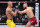 NEW YORK, NEW YORK - NOVEMBER 11: Jiri Prochazka of the Czech Republic punches Alex Pereira of Brazil in the UFC light heavyweight championship fight during the UFC 295 event at Madison Square Garden on November 11, 2023 in New York City. (Photo by Chris Unger/Zuffa LLC via Getty Images)