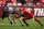 LANDOVER, MD - DECEMBER 31: Brandon Aiyuk #11 of the San Francisco 49ers runs with the ball against Emmanuel Forbes #13 of the Washington Commanders during the second half of the game at FedExField on December 31, 2023 in Landover, Maryland. (Photo by Scott Taetsch/Getty Images)