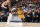 DENVER, CO - MAY 18: Dennis Schroder #17 of the Los Angeles Lakers dribbles the ball during Game 2 of the Western Conference Finals 2023 NBA Playoffs on May 18, 2023 at the Ball Arena in Denver, Colorado. NOTE TO USER: User expressly acknowledges and agrees that, by downloading and/or using this Photograph, user is consenting to the terms and conditions of the Getty Images License Agreement. Mandatory Copyright Notice: Copyright 2023 NBAE (Photo by Andrew D. Bernstein/NBAE via Getty Images)