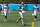 Costa Mesa, CA - June 13: Chargers center/guard Bucky Williams, left, #60, outside linebacker Joey Bosa, #97, center, and guard Zion Johnson, right, walk off the field during the Chargers mini camp at Hoag Performance Center in Costa Mesa Thursday, June 13, 2024. (Allen J. Schaben / Los Angeles Times via Getty Images)