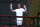 LONDON, ENGLAND - JULY 04: Andy Murray of Great Britain waves to the crowd on the player's walkway bridge following the Gentlemen’s Doubles first round match with Jamie Murray against Rinky Hijikata and John Peers of Australia during day four of The Championships Wimbledon 2024 at All England Lawn Tennis and Croquet Club on July 04, 2024 in London, England. (Photo by Sean M. Haffey/Getty Images)
