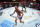 Max Holloway celebrates his knockout win over Justin Gaethje