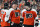PHILADELPHIA, PENNSYLVANIA - APRIL 16: Travis Konecny #11, Owen Tippett #74 and Jamie Drysdale #9 of the Philadelphia Flyers gather during a stoppage in play against the Washington Capitals at the Wells Fargo Center on April 16, 2024 in Philadelphia, Pennsylvania. (Photo by Len Redkoles/NHLI via Getty Images)