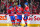 MONTREAL, CANADA - FEBRUARY 10: Nick Suzuki #14 of the Montreal Canadiens celebrates his goal with teammates Cole Caufield #22 and Juraj Slafkovsky #20 during the second period against the Dallas Stars at the Bell Centre on February 10, 2024 in Montreal, Quebec, Canada. (Photo by Minas Panagiotakis/Getty Images)