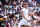 Kazakhstan's Elena Rybakina celebrates winning against Ukraine's Elina Svitolina during their women's singles quarter-finals tennis match on the tenth day of the 2024 Wimbledon Championships at The All England Lawn Tennis and Croquet Club in Wimbledon, southwest London, on July 10, 2024. (Photo by HENRY NICHOLLS / AFP) / RESTRICTED TO EDITORIAL USE (Photo by HENRY NICHOLLS/AFP via Getty Images)