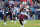 CHARLOTTESVILLE, VA - NOVEMBER 25: Virginia Tech Hokies wide receiver Jaylin Lane (83) hauls in a pass then rushes up field en route to scoring a touchdown while eluding Virginia Cavaliers defensive back Jonas Sanker (20) during a college football game between the Virginia Tech Hokies and the Virginia Cavaliers on November 25, 2023, at Scott Stadium in Charlottesville, VA. (Photo by Lee Coleman/Icon Sportswire via Getty Images)