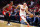 MIAMI, FLORIDA - DECEMBER 14: Duncan Robinson #55 of the Miami Heat drives against DeMar DeRozan #11 of the Chicago Bulls during the first quarter of the game at Kaseya Center on December 14, 2023 in Miami, Florida. NOTE TO USER: User expressly acknowledges and agrees that, by downloading and or using this photograph, User is consenting to the terms and conditions of the Getty Images License Agreement. (Photo by Megan Briggs/Getty Images)