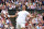 LONDON, ENGLAND - JULY 12: Carlos Alcaraz of Spain celebrates winning match point against Daniil Medvedev in the Men's Singles Semi-Final match during day twelve of The Championships Wimbledon 2024 at All England Lawn Tennis and Croquet Club on July 12, 2024 in London, England. (Photo by Sean M. Haffey/Getty Images)