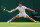 LONDON, ENGLAND - JULY 12: Carlos Alcaraz of Spain plays a forehand in the Men's Singles semi finals match against Daniil Medvedev during day twelve of The Championships Wimbledon 2024 at All England Lawn Tennis and Croquet Club on July 12, 2024 in London, England. (Photo by Shi Tang/Getty Images)