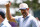 STATELINE, NEVADA - JULY 12: NFL football player Aaron Rodgers gives a thumbs up to the crowd at the 15th hole on day one of the 2024 American Century Championship at Edgewood Tahoe Golf Course on July 12, 2024 in Stateline, Nevada. (Photo by Isaiah Vazquez/Getty Images)