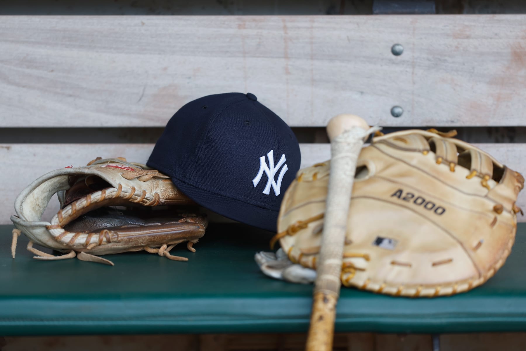 OAKLAND, CALIFORNIA - JUNE 27: A Novel York Yankees hat sits within the dugout forward of the game between the Oakland Athletics and the Novel York Yankees at RingCentral Coliseum on June 27, 2023 in Oakland, California. (Portray by Lachlan Cunningham/Getty Pictures)