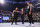 DETROIT, MICHIGAN - APRIL 12: Solo Sikoa speaks with Paul Heyman and Jimmy Uso during Friday Night Smackdown at Little Caesars Arena on April 12, 2024 in Detroit, Michigan. (Photo by WWE/Getty Images)
