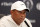 TROON, SCOTLAND - JULY 16: Tiger Woods of the United States talks to the media during a press conference prior to The 152nd Open championship at Royal Troon on July 16, 2024 in Troon, Scotland. (Photo by Warren Little/Getty Images)