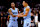 NEW ORLEANS, LOUISIANA - DECEMBER 26: Ja Morant #12 of the Memphis Grizzlies reacts with Desmond Bane #22 of the Memphis Grizzlies during overtime of an NBA game against the New Orleans Pelicans at Smoothie King Center on December 26, 2023 in New Orleans, Louisiana. The Memphis Grizzlies won the game 116 - 115 over the New Orleans Pelicans. NOTE TO USER: User expressly acknowledges and agrees that, by downloading and or using this photograph, User is consenting to the terms and conditions of the Getty Images License Agreement. (Photo by Sean Gardner/Getty Images)
