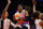 PHOENIX, ARIZONA - JULY 20: Arike Ogunbowale #24 of Team WNBA goes up over Napheesa Collier #11 of Team USA during the second half of the 2024 WNBA All Star Game at Footprint Center on July 20, 2024 in Phoenix, Arizona.  (Photo by Alex Slitz/Getty Images)