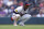 ATLANTA, GEORGIA - JULY 21: Ozzie Albies #1 of the Atlanta Braves reacts after an injury during the ninth inning against the St. Louis Cardinals at Truist Park on July 21, 2024 in Atlanta, Georgia. (Photo by Todd Kirkland/Getty Images)