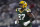 ARLINGTON, TX - JANUARY 14: Kenny Clark #97 of the Green Bay Packers runs across the field during an NFL wild-card playoff football game against the Dallas Cowboys at AT&T Stadium on January 14, 2024 in Arlington, Texas. (Photo by Perry Knotts/Getty Images)