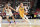 LAS VEGAS, NEVADA - JULY 18: Dalton Knecht #4 of the Los Angeles Lakers drives past Pete Nance #8 of the Cleveland Cavaliers in the first half of a 2024 NBA Summer League game at the Thomas & Mack Center on July 18, 2024 in Las Vegas, Nevada. The Lakers defeated the Cavaliers 93-89. NOTE TO USER: User expressly acknowledges and agrees that, by downloading and or using this photograph, User is consenting to the terms and conditions of the Getty Images License Agreement. (Photo by Candice Ward/Getty Images)