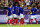 France's defender #05 Kiliann Sildillia (C) is congratulated by his teammates after scoring in the men's group A football match between France and Guinea during the Paris 2024 Olympic Games at the Nice Stadium in Nice on July 27, 2024. (Photo by Valery HACHE / AFP) (Photo by VALERY HACHE/AFP via Getty Images)