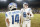 GREEN BAY, WISCONSIN - JANUARY 08: Jared Goff #16 and Amon-Ra St. Brown #14 of the Detroit Lions react after defeating the Green Bay Packers at Lambeau Field on January 08, 2023 in Green Bay, Wisconsin. (Photo by Patrick McDermott/Getty Images)