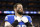 DETROIT, MI - JANUARY 21: Taylor Decker #68 of the Detroit Lions stands on the sidelines during the national anthem prior to an NFL divisional round playoff football game against the Tampa Bay Buccaneers at Ford Field on January 21, 2024 in Detroit, Michigan. (Photo by Kevin Sabitus/Getty Images)