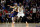 SAN FRANCISCO, CALIFORNIA - JANUARY 27: Stephen Curry #30 of the Golden State Warriors matches up against LeBron James #23 of the Los Angeles Lakers in overtime at Chase Center on January 27, 2024 in San Francisco, California. NOTE TO USER: User expressly acknowledges and agrees that, by downloading and or using this photograph, User is consenting to the terms and conditions of the Getty Images License Agreement. (Photo by Ezra Shaw/Getty Images)