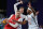 Poland's #03 Michal Sokolowski (L) fights for the ball with US' #05 Jimmer Fredette (C) and US' #09 Kareem Maddox in the men's pool round 3x3 basketball game between the USA and Poland during the Paris 2024 Olympic Games at La Concorde in Paris on July 31, 2024. (Photo by David GRAY / AFP) (Photo by DAVID GRAY/AFP via Getty Images)
