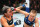 Rose Namajunas punches Tracy Cortez.