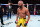 Deiveson Figueiredo reacts after submitting Cody Garbrandt 