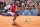 PARIS, FRANCE - AUGUST 04: Novak Djokovic of Team Serbia celebrates match point during the Men's Singles Gold medal match against Carlos Alcaraz of Team Spain on day nine of the Olympic Games Paris 2024 at Roland Garros on August 04, 2024 in Paris, France. (Photo by Clive Brunskill/Getty Images)