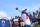 US' Scottie Scheffler competes in round 4 of the men's golf individual stroke play of the Paris 2024 Olympic Games at Le Golf National in Guyancourt, south-west of Paris on August 4, 2024. (Photo by Emmanuel DUNAND / AFP) (Photo by EMMANUEL DUNAND/AFP via Getty Images)