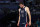 PARIS, FRANCE - AUGUST 02: Jimmer Fredette #5 of Team United States looks on during a Men's 3x3 Basketball Pool Round game between the United States and France on day seven of the Olympic Games Paris 2024 at Esplanade Des Invalides on August 02, 2024 in Paris, France. (Photo by Lintao Zhang/Getty Images)