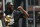 BOSTON, MASSACHUSETTS - JUNE 21: Jaylen Brown #7 of the Boston Celtics reacts while holding the NBA Finals Most Valuable Player trophy during the Boston Celtics' 2024 championship parade following their victory in the 2024 NBA Finals on June 21, 2024 in Boston, Massachusetts. (Photo by Billie Weiss/Getty Images)