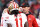 PHILADELPHIA, PENNSYLVANIA - DECEMBER 03: Head coach Kyle Shanahan of the San Francisco 49ers speaks with Brandon Aiyuk #11 prior to the game against the Philadelphia Eagles at Lincoln Financial Field on December 03, 2023 in Philadelphia, Pennsylvania. (Photo by Tim Nwachukwu/Getty Images)