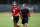 HOUSTON, TEXAS - JUNE 05: C.J. Stroud #7 of the Houston Texans and offensive coordinator Bobby Slowik stand on the field during mandatory minicamp at Houston Methodist Training Center on June 05, 2024 in Houston, Texas. (Photo by Tim Warner/Getty Images)