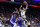 PHILADELPHIA, PENNSYLVANIA - NOVEMBER 15: Jayson Tatum #0 of the Boston Celtics drives for a lay up past Joel Embiid #21 of the Philadelphia 76ers during the third quarter at the Wells Fargo Center on November 15, 2023 in Philadelphia, Pennsylvania. NOTE TO USER: User expressly acknowledges and agrees that, by downloading and or using this photograph, User is consenting to the terms and conditions of the Getty Images License Agreement. (Photo by Tim Nwachukwu/Getty Images)