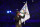 TOPSHOT - US' actor Tom Cruise waves the Olympic flag during the closing ceremony of the Paris 2024 Olympic Games at the Stade de France, in Saint-Denis, in the outskirts of Paris, on August 11, 2024. (Photo by Franck FIFE / AFP) (Photo by FRANCK FIFE/AFP via Getty Images)