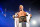 ROSEMONT, ILLINOIS - JUNE 21: WWE Undisputed Champion Cody Rhodes reacts as he makes his entrance during WWE SmackDown at Allstate Arena on June 21, 2024 in Rosemont, Illinois. (Photo by WWE/Getty Images)