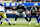 INGLEWOOD, CALIFORNIA - AUGUST 11: Tyler Guyton #60 of the Dallas Cowboys blocks during a preseason game against the Los Angeles Rams at SoFi Stadium on August 11, 2024 in Inglewood, California. (Photo by Ric Tapia/Getty Images)