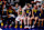 INDIANAPOLIS, IN – AUGUST 18: Indiana Fever forward Aliyah Boston (7) laughs with Indiana Fever defender Caitlin Clark (22) on the bench in the final minutes of the fourth quarter during a WNBA game between the Seattle Storm and the Indiana Fever on August 18, 2024 at Gainbridge Fieldhouse in Indianapolis, IN. (Photo by Jeffrey Brown/Icon Sportswire via Getty Images)