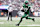 EAST RUTHERFORD, NEW JERSEY - DECEMBER 24: Garrett Wilson #17 of the New York Jets runs with the ball during the first half against the Washington Commanders at MetLife Stadium on December 24, 2023 in East Rutherford, New Jersey. (Photo by Dustin Satloff/Getty Images)