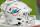 MIAMI GARDENS, FL - AUGUST 17:a Miami Dolphins helmet rests near the sidelines during the game between the Washington Commanders and the Miami Dolphins on Saturday, August 17, 2024 at Hard Rock Stadium in Miami Gardens, Fla. (Photo by Peter Joneleit/Icon Sportswire via Getty Images)