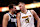 DALLAS, TX - MARCH 17: Luka Doncic #77 of the Dallas Mavericks and Nikola Jokic #15 of the Denver Nuggets chat during a 'beak in the action' during the second half at American Airlines Center on March 17, 2024 in Dallas, Texas. NOTE TO USER: User expressly acknowledges and agrees that by downloading and/or using this photo, User agrees to the terms and conditions of the Getty Images License Agreement. (Photo by Ron Jenkins/Getty Images)